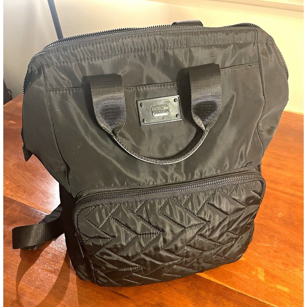 Steve Madden Women’s Black Quilted Backpack, Top Handle, Pockets, Broken Zip